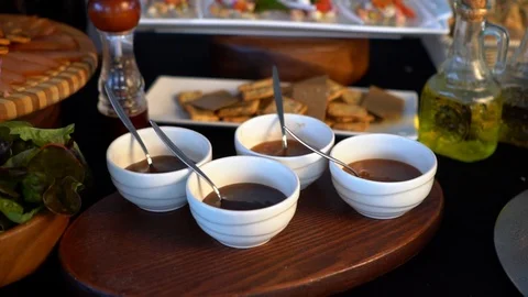 Sauce in small cups with a spoon. Stock Footage 107605886