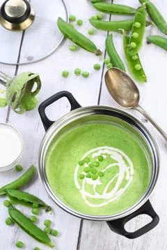 Saucepan with mashed pea soup Stock Photos