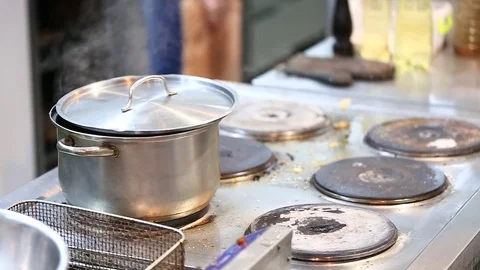 Saucepan on the stove Stock Footage 72871462
