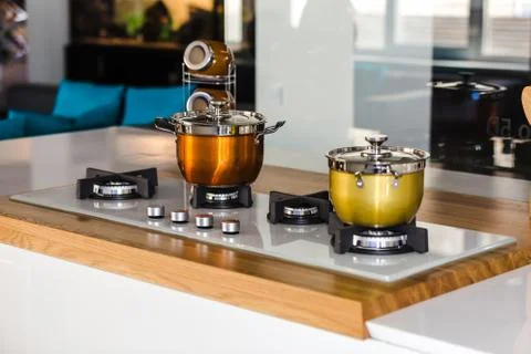 Saucepan on the stove Stock Photos