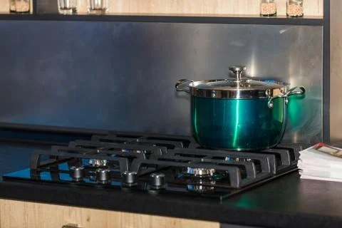 Saucepan on the stove Stock Photos