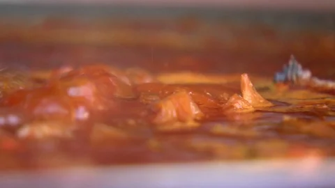 Saucepan of tomato sauce Stock Footage 123580446