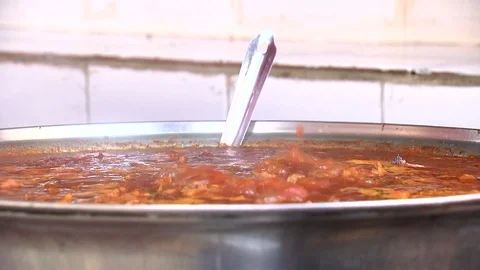 Saucepan of tomato sauce Stockbeeldmateriaal 123580458