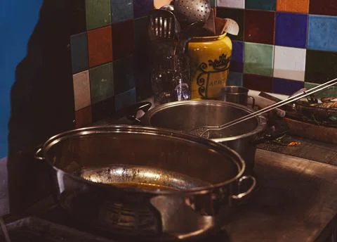 Saucepans in the kitchen Stock Photos