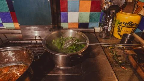 Saucepans in the kitchen Stock Photos