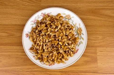 A saucer with nuts. Stock Photos
