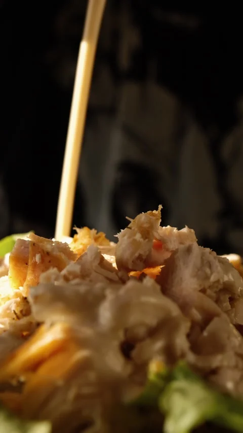 Saucing cesar salad slow motion vertical video Stock Footage 155080145