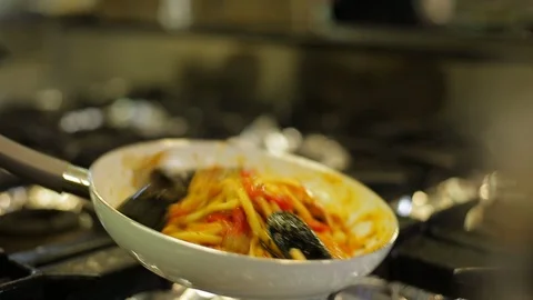 Saucing seafood spaghetti in a pan Stock Footage 88439506