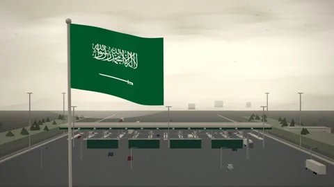 Saudi Arabia Flag Flying Over Motorway Toll Plaza Traffic seamless loop Stock Footage 345130474