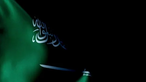 Saudi Arabia flag waving gracefully on black background Video stock 334873930