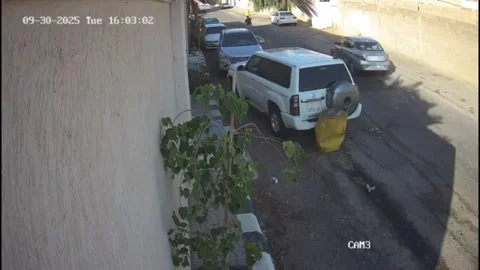 Saudi Arabia: Hit-and-run crash caught on camera in Riyad, Saudi Arabia Stock Footage 320794546
