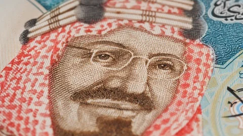 Saudi Arabia King Saud Bin Abdulaziz portrait on 20 riyals banknote rotating. 4K Stock Footage 124165958