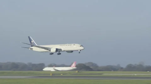 Saudi Boeing 787 Dreamliner Passenger Airplane Landing, Busy Airport, Sunny Day Stock Footage 171501550