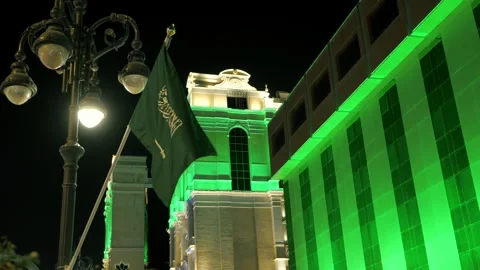 Saudi Flag Waving at Night During National Day Celebration Stock-Footage 309780911