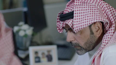 Saudi man listens Stock Footage 121903663