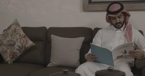  Saudi man Reading Book Stock Footage 121903186