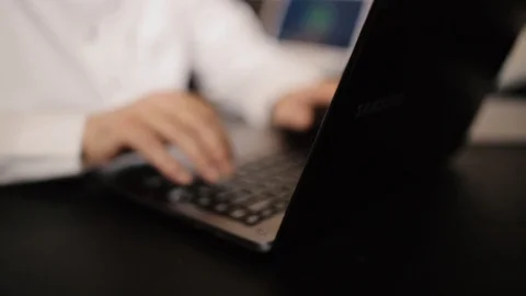 Saudi man typing on laptop Stock Footage 112950131