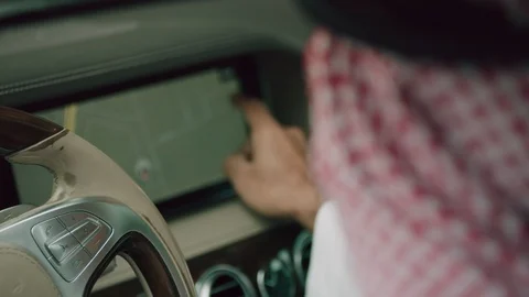 Saudi man using car navigation. Stock Footage 105802639
