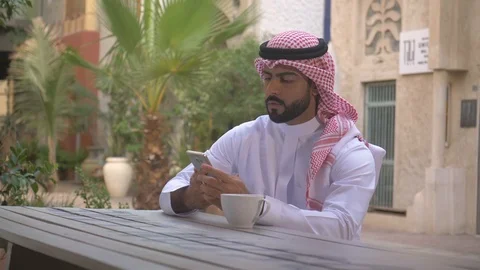 Saudi man using mobile phone. Stock Footage 94486035