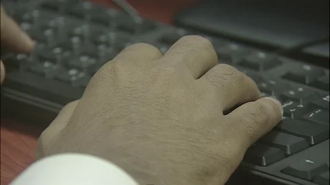 Saudi Man Working On Keyboard and Mouse in Office Video stock 82779328
