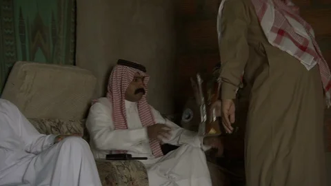 Saudi men discussing Stock Footage 120059779