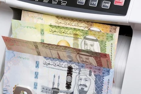 Saudi riyal in a counting machine Stock Photos