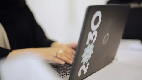 Saudi woman typing in keyboad with vision 2030 Stock Footage 110715982
