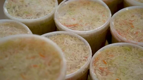 Sauerkraut in Plastic Containers is in the Warehouse, ready to be sent to Stores Stock Footage 144860114
