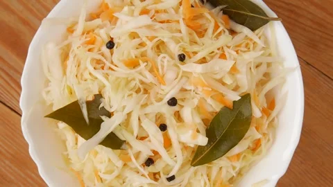 Sauerkraut on a plate, revolves. Stock Footage 240276099