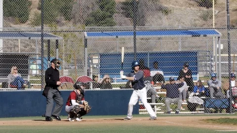 Saugus High School Baseball game, player at bat ready to hit zoom out Stock Footage 124954077