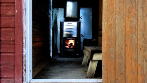 Sauna Door Open And Fire going Stock Footage 112271293