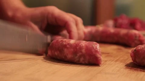 Sausage cutting on cutting board Stock Footage 146850184
