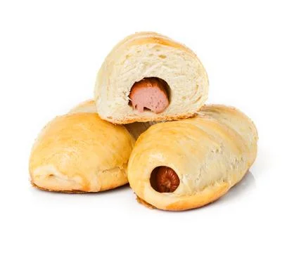 Sausage in the dough close-up isolated on a white background. Stock Photos