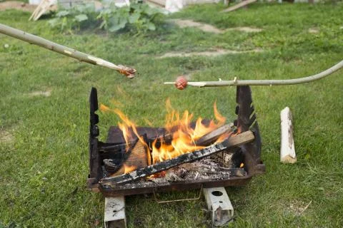 Sausage on fire Stock Photos