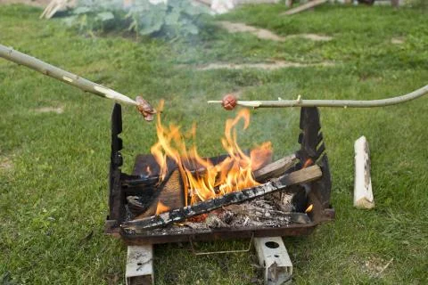 Sausage on fire Stock Photos