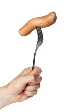 Sausage on fork Stock Photos