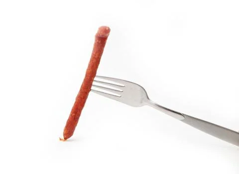 Sausage on a fork Stock Photos
