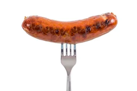 Sausage on a fork Stock Photos