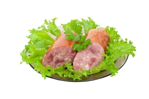 Sausage with green vegetable Stock Photos