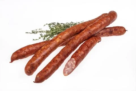 Sausage With Greenery Stock Photos