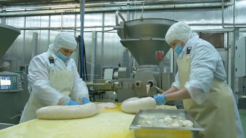 Sausage making process meat factory Stock Footage 128357002