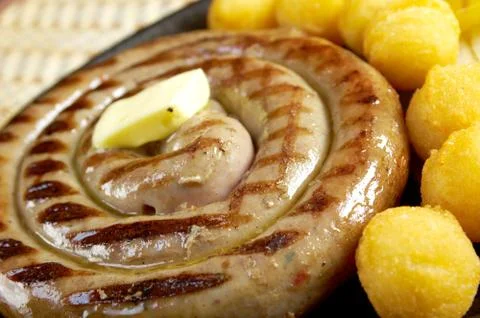 Sausage making roasted with vegetable Foto stock
