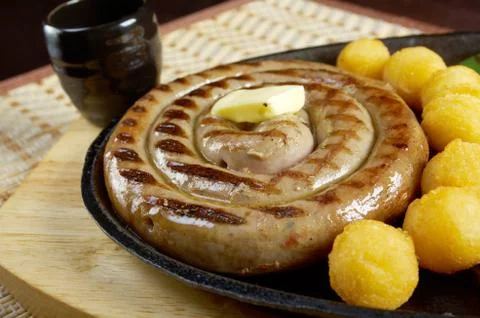 Sausage making roasted with vegetable Stock Photos