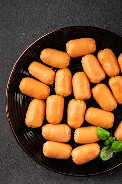 Sausage mini meat portion size fast food natural product tasty snack fresh .. Stock Photos