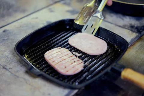 The sausage in the pan Stock Photos