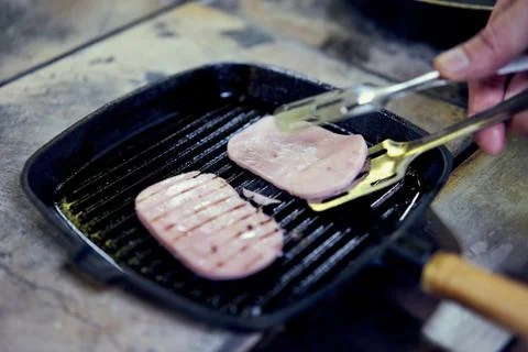 The sausage in the pan Stock Photos