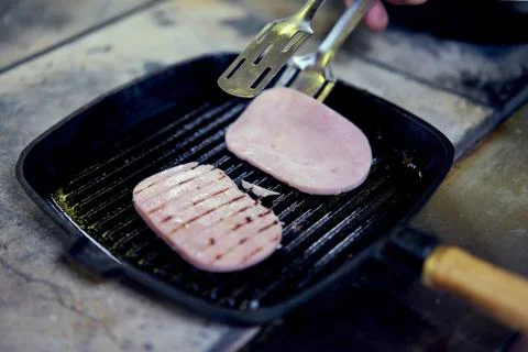 The sausage in the pan Stock Photos