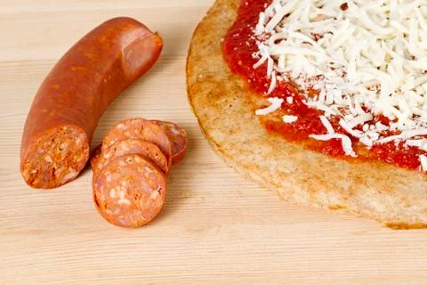 Sausage with pizza Stock Photos