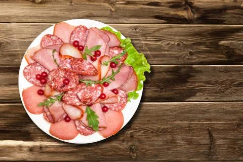 Sausage platter on the table Stock Photos