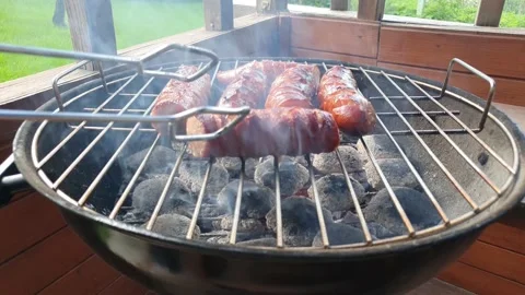 The sausage is roasting on the grill. 스톡 동영상 159274531